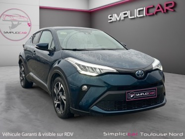 Toyota c-hr hybride my23 1.8l design lane assist clim bi zone garantie 12 mois occasion simplicicar toulouse nord simplicicar...