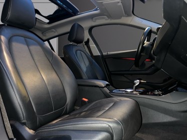 Bmw serie 1 f40 118i 140 ch dkg7 luxury/toit ouvrant/siÈges chauffantÉlec/ affichage tete haute/car play/camÉra de...