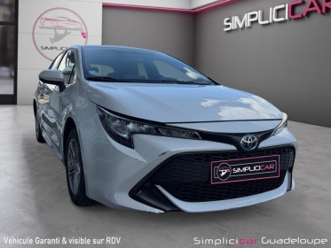 Toyota corolla hybride my21 122h dynamic occasion simplicicar guadeloupe  simplicicar simplicibike france