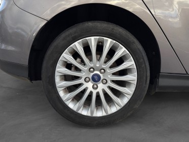 Ford focus 1.6 tdci 115 titanium - 2° main/suivi complet/clim/radar/phares auto - garantie 12 mois occasion simplicicar...
