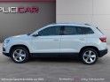 Skoda karoq 1.0 tsi 116 ch business carplay / toit ouvrant / virtual cockpit occasion simplicicar veauche simplicicar...