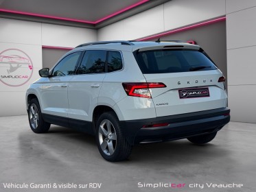 Skoda karoq 1.0 tsi 116 ch business carplay / toit ouvrant / virtual cockpit occasion simplicicar veauche simplicicar...