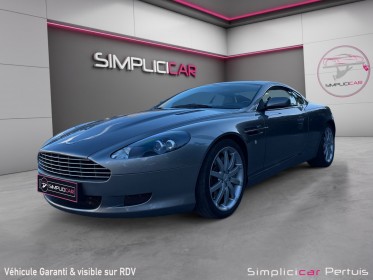 Aston martin  db9 v12 5.9l état concours entretien complet aston martin garantie 12 mois opteven a voir absolument occasion...