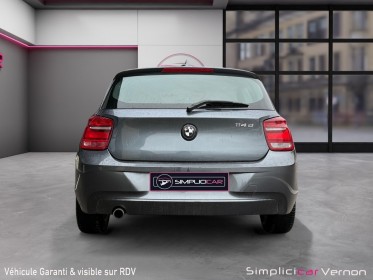 Bmw serie 1 f21 114d 95 ch 112g lounge 3 portes intérieur cuir bi-ton garantie 12 mois occasion simplicicar vernon...