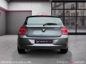 Bmw serie 1 f21 114d 95 ch 112g lounge 3 portes intérieur cuir bi-ton garantie 12 mois occasion simplicicar vernon...