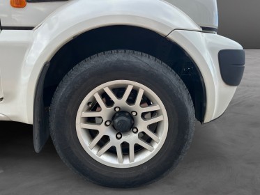 Suzuki jimny 1.3i 85 vvt jlx 4wd 4pl bva clim attelage garantie 12 mois europe occasion simplicicar perpignan  simplicicar...