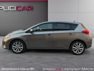 Toyota auris hybride 136h style - siège chauffants - entretien complet toyota occasion simplicicar lagny  simplicicar...