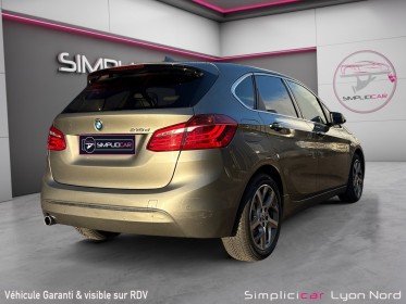 Bmw serie 2 active tourer f45 218d 150 ch luxury a / siege chauffant / garantie 12 mois occasion simplicicar lyon nord...