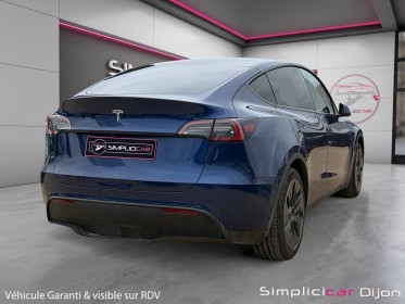 Tesla model y standard rwd sièges chauffants volant chauffant garantie constructeur occasion simplicicar dijon simplicicar...
