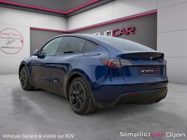 Tesla model y standard rwd sièges chauffants volant chauffant garantie constructeur occasion simplicicar dijon simplicicar...