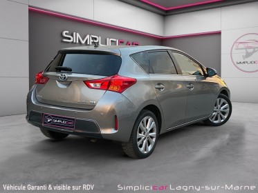 Toyota auris hybride 136h style -  entretien complet toyota - siège chauffants occasion simplicicar lagny  simplicicar...