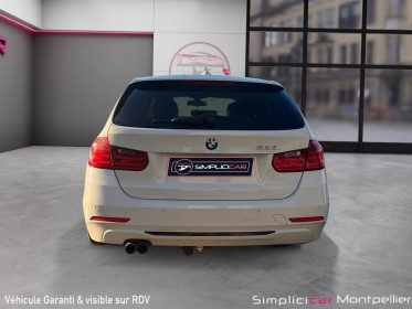 Bmw serie 3 touring f31 328i 245 ch sport a garantie 12 mois occasion montpellier (34) simplicicar simplicibike france