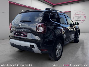 Dacia duster blue dci 95 4x2 access occasion simplicicar guadeloupe  simplicicar simplicibike france