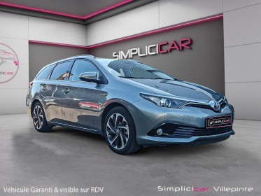 Toyota auris touring sports pro my17 hybride pro 136h design 1 er main garantie 12 mois occasion simplicicar villepinte...