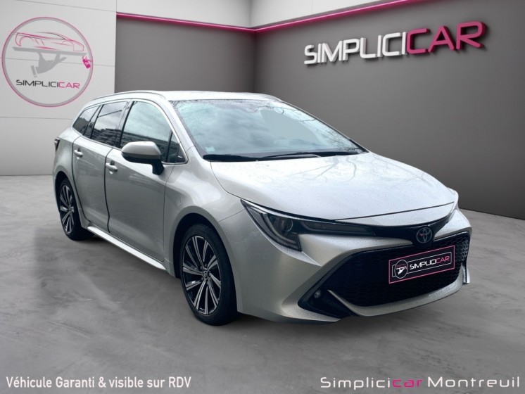 Toyota corolla touring sports hybride my22 122h design garantie 12 mois carplay sièges chauffants occasion montreuil (porte...