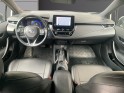Toyota corolla touring sports hybride my22 122h design garantie 12 mois carplay sièges chauffants occasion montreuil (porte...