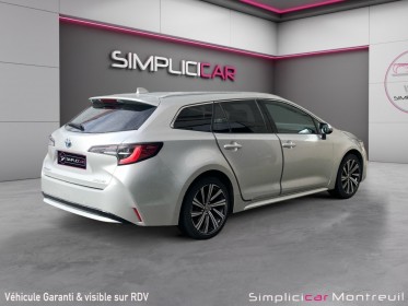 Toyota corolla touring sports hybride my22 122h design garantie 12 mois carplay sièges chauffants occasion montreuil (porte...
