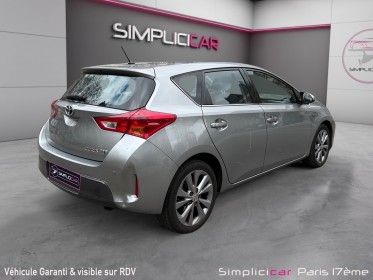 Toyota auris business hybride 136h business/entretien a jour/sieges chauffant occasion paris 17ème (75)(porte maillot)...