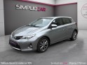 Toyota auris business hybride 136h business/entretien a jour/sieges chauffant occasion paris 17ème (75)(porte maillot)...