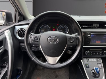 Toyota auris business hybride 136h business/entretien a jour/sieges chauffant occasion paris 17ème (75)(porte maillot)...