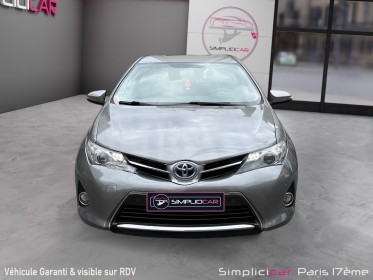 Toyota auris business hybride 136h business/entretien a jour/sieges chauffant occasion paris 17ème (75)(porte maillot)...