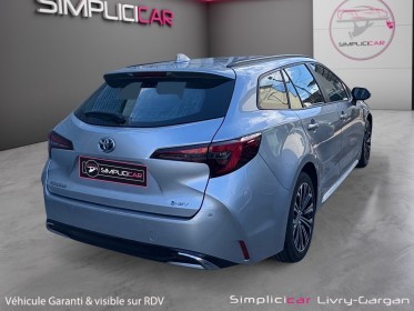 Toyota corolla touring sports hybride nouvelle 140ch design occasion simplicicar livry gargan simplicicar simplicibike france