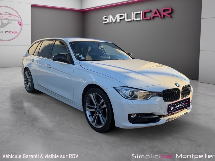 Bmw serie 3 touring f31 328i 245 ch sport a garantie 12 mois occasion montpellier (34) simplicicar simplicibike france