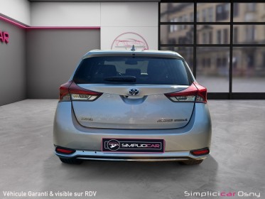 Toyota auris hybride 136h design toit panoramique garantie 12mois occasion osny simplicicar simplicibike france