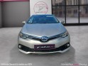 Toyota auris hybride 136h design toit panoramique garantie 12mois occasion osny simplicicar simplicibike france