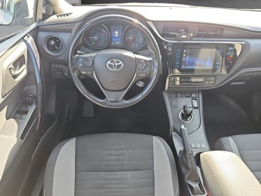 Toyota auris hybride 136h design toit panoramique garantie 12mois occasion osny simplicicar simplicibike france