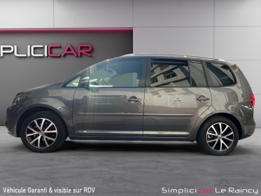 Volkswagen touran n1 1.2 tsi 105 bluemotion confortline entretiens a jour garantie 12 mois occasion simplicicar le raincy...