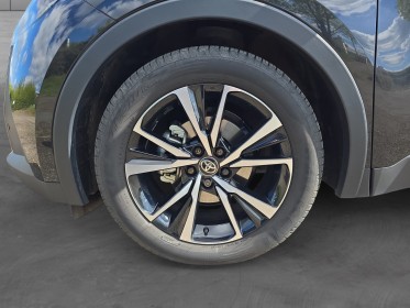 Toyota c-hr hybride my23 1.8l design 122 ch cvt caméra de recul révisée garantie toyota 12 mois hayon electrique occasion...