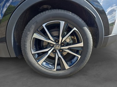 Toyota c-hr hybride my23 1.8l design 122 ch cvt caméra de recul révisée garantie toyota 12 mois hayon electrique occasion...