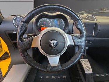 Tesla roadster 56 kwh autonomie environ 300 km pas de malus révisée garantie 12 mois occasion simplicicar vichy simplicicar...