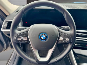 Bmw i4 g26 edrive40 340 ch bva business design garantie 12 mois occasion simplicicar limoges  simplicicar simplicibike france