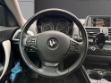 Bmw serie 1 f21 114d 95 ch 112g lounge 3 portes intérieur cuir bi-ton garantie 12 mois occasion simplicicar vernon...