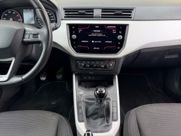 Seat arona 1.0 ecotsi 115 ch start/stop bvm6 xcellence 2eme main radar de recul carplay barre de toit suivi limpide...