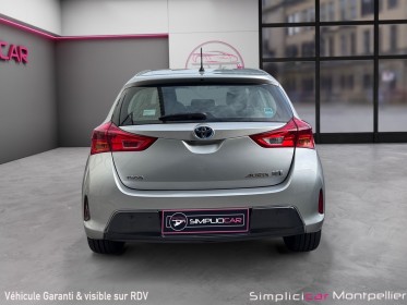 Toyota auris hybride 136h dynamic garantie 12 mois occasion montpellier (34) simplicicar simplicibike france