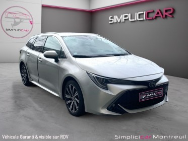 Toyota corolla touring sports hybride my22 122h design garantie 12 mois carplay sièges chauffants occasion montreuil (porte...