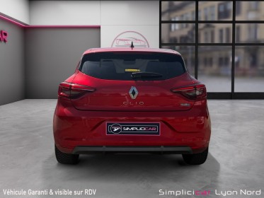Renault clio v e-tech hybride 145 rs line garantie 12 mois, caméra de recul occasion simplicicar lyon nord simplicicar...