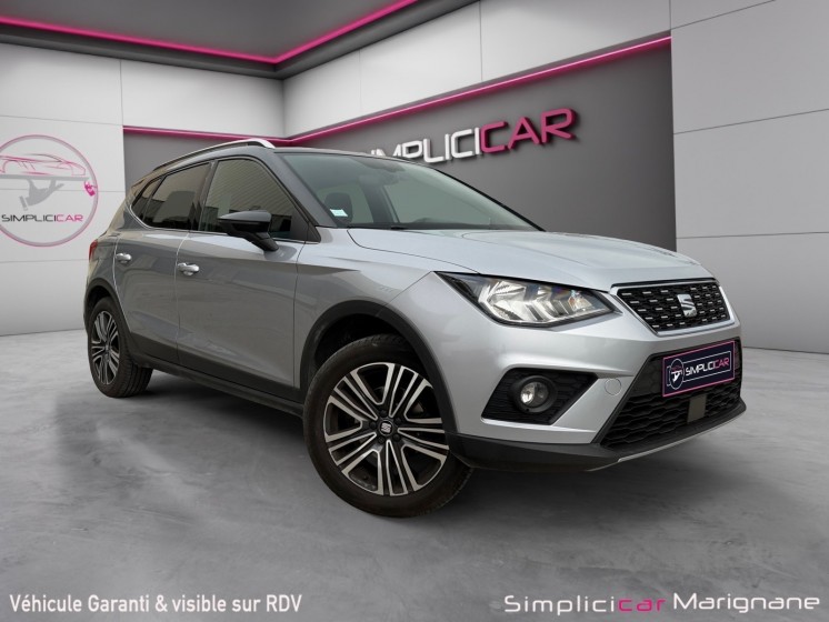 Seat arona 1.0 ecotsi 115 ch start/stop bvm6 xcellence 2eme main radar de recul carplay barre de toit suivi limpide...