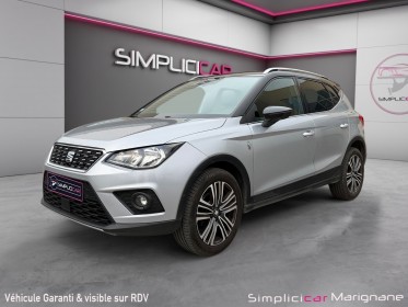 Seat arona 1.0 ecotsi 115 ch start/stop bvm6 xcellence 2eme main radar de recul carplay barre de toit suivi limpide...