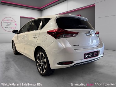 Toyota auris hybride 136h design garantie toyota occasion montpellier (34) simplicicar simplicibike france