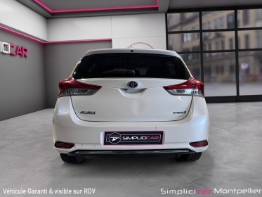 Toyota auris hybride 136h design garantie toyota occasion montpellier (34) simplicicar simplicibike france