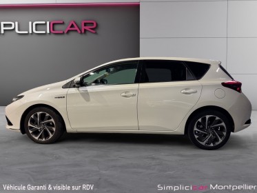 Toyota auris hybride 136h design garantie toyota occasion montpellier (34) simplicicar simplicibike france