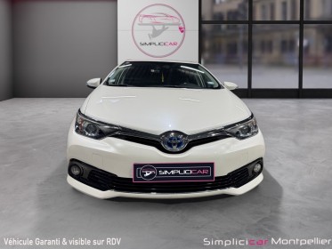 Toyota auris hybride 136h design garantie toyota occasion montpellier (34) simplicicar simplicibike france
