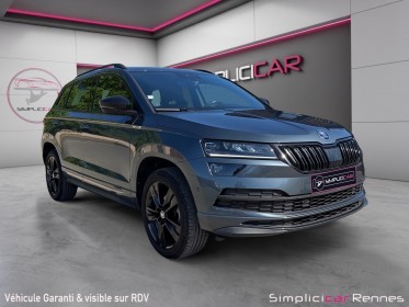 Skoda karoq 1.5 tsi 150 ch act dsg7 sportline carplay suivi skoda garantie 12 mois occasion simplicicar rennes simplicicar...