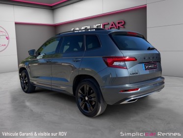 Skoda karoq 1.5 tsi 150 ch act dsg7 sportline carplay suivi skoda garantie 12 mois occasion simplicicar rennes simplicicar...