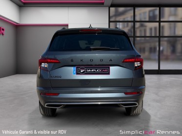 Skoda karoq 1.5 tsi 150 ch act dsg7 sportline carplay suivi skoda garantie 12 mois occasion simplicicar rennes simplicicar...