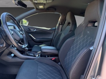 Skoda karoq 1.5 tsi 150 ch act dsg7 sportline carplay suivi skoda garantie 12 mois occasion simplicicar rennes simplicicar...